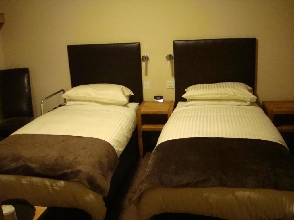 Letto o letti in una camera di Seaview John O Groats Hotel