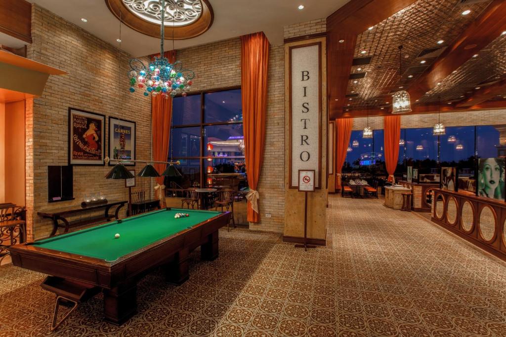 a billiard room with a pool table at InterContinental Grand Ho Tram in Ho Tram