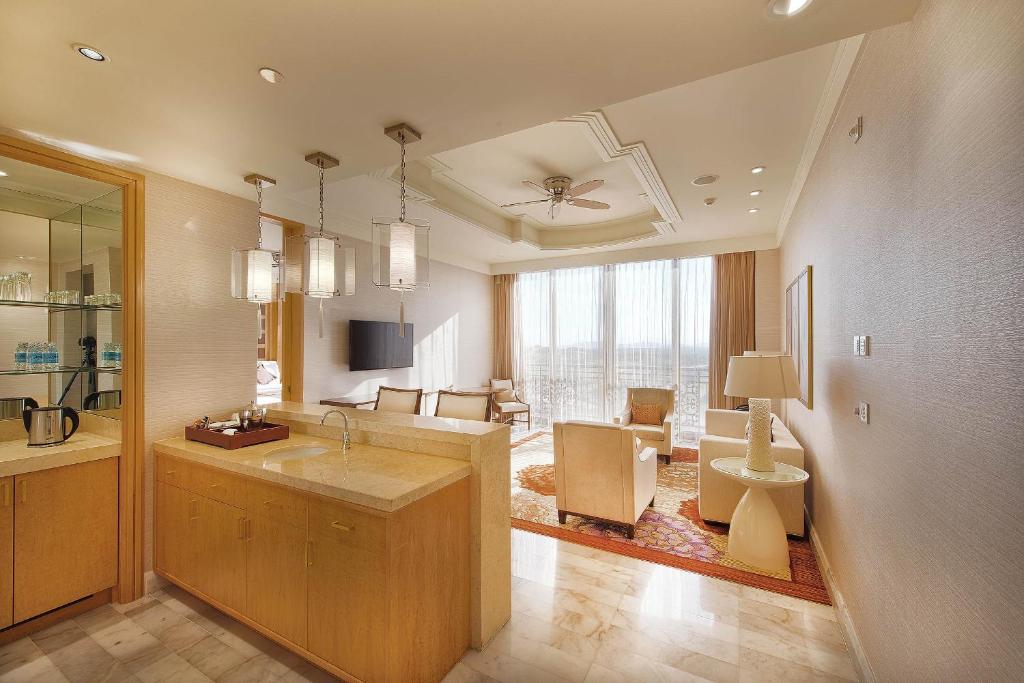 a large room with a kitchen and a living room at InterContinental Grand Ho Tram in Ho Tram