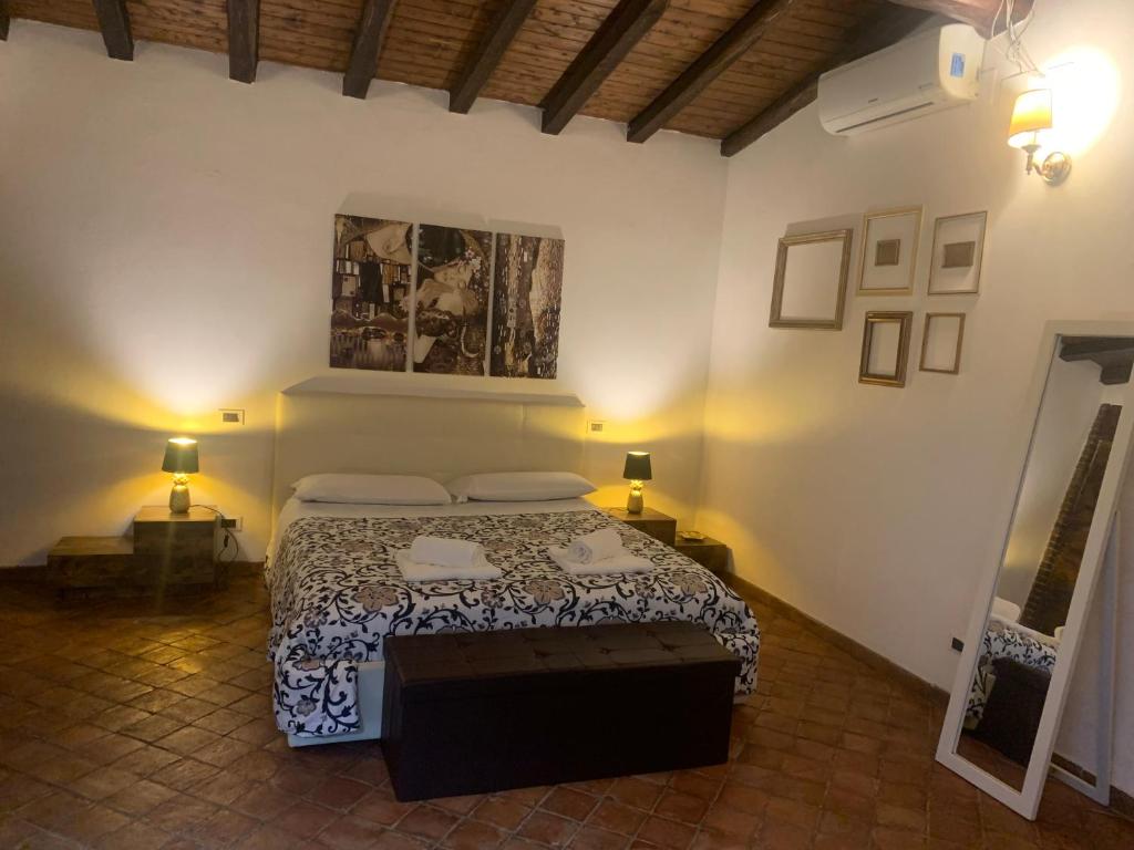 Postel nebo postele na pokoji v ubytování B&B Villa Loriana