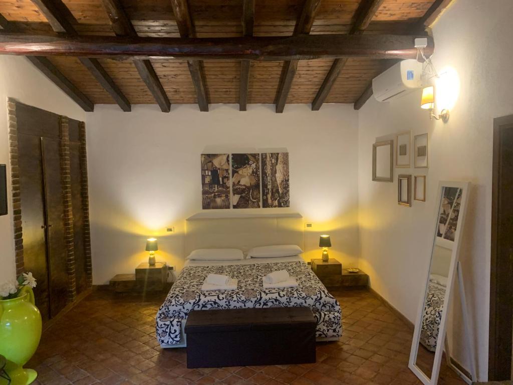 Postel nebo postele na pokoji v ubytování B&B Villa Loriana