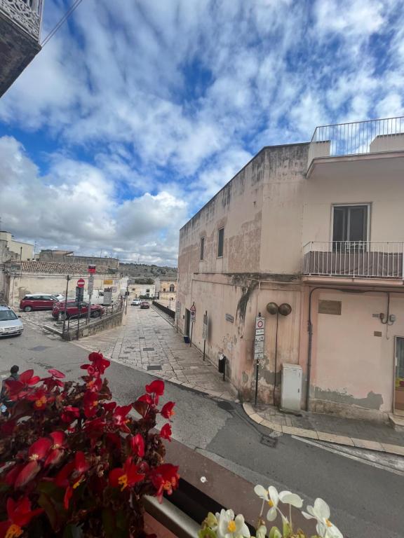 a view from a balcony of a street with buildings at Il Nicchio in Matera