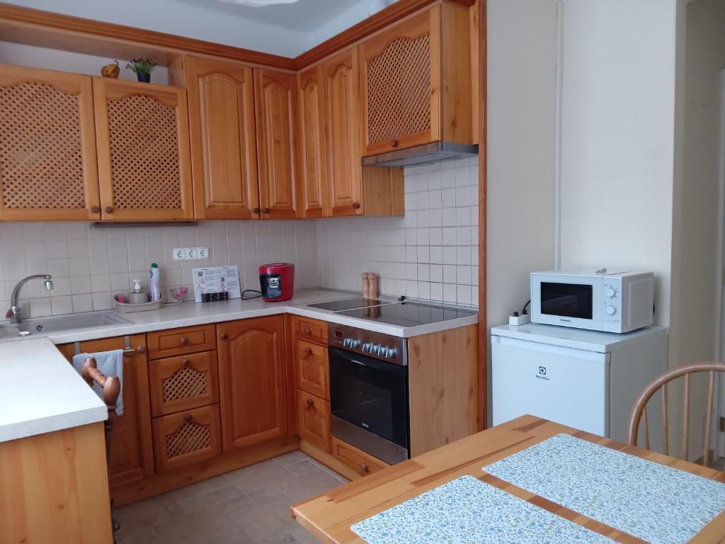 A cozinha ou cozinha compacta de Gy&ouml;ngy Apartman