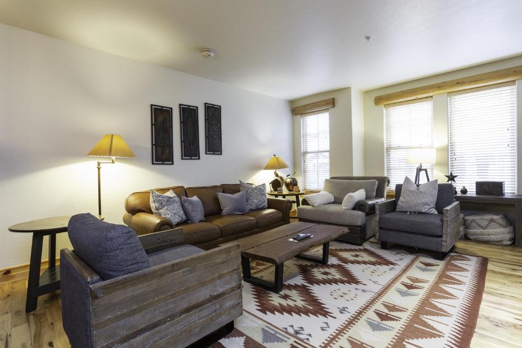 a living room with a couch and chairs and a table at 2 Bedroom Condo - The Lodges at Deer Valley condo in Park City