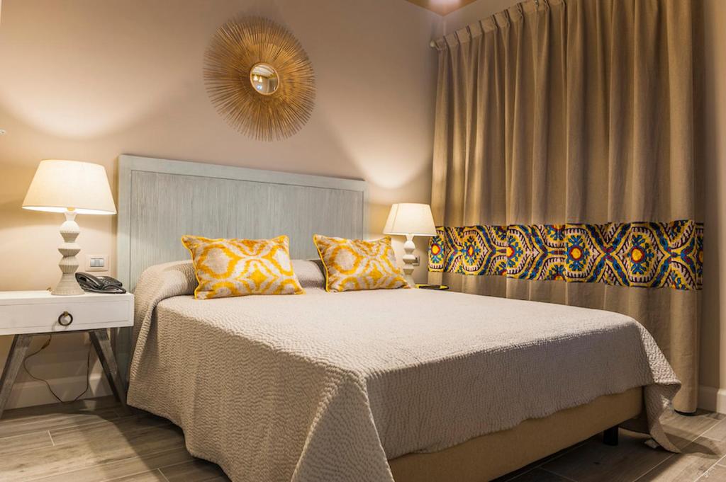 Posteľ alebo postele v izbe v ubytovaní Hotel San Michele