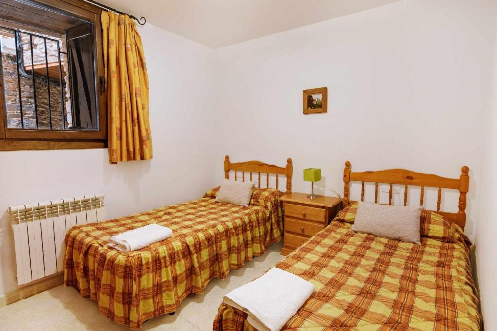 Postel nebo postele na pokoji v ubytování Casa Xaupí Gran
