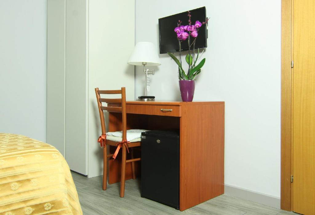 TV a/nebo společenská místnost v ubytování Albergo Al Viale