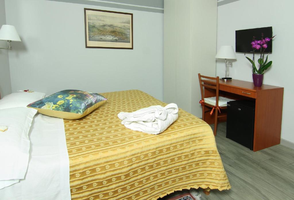 Postel nebo postele na pokoji v ubytování Albergo Al Viale