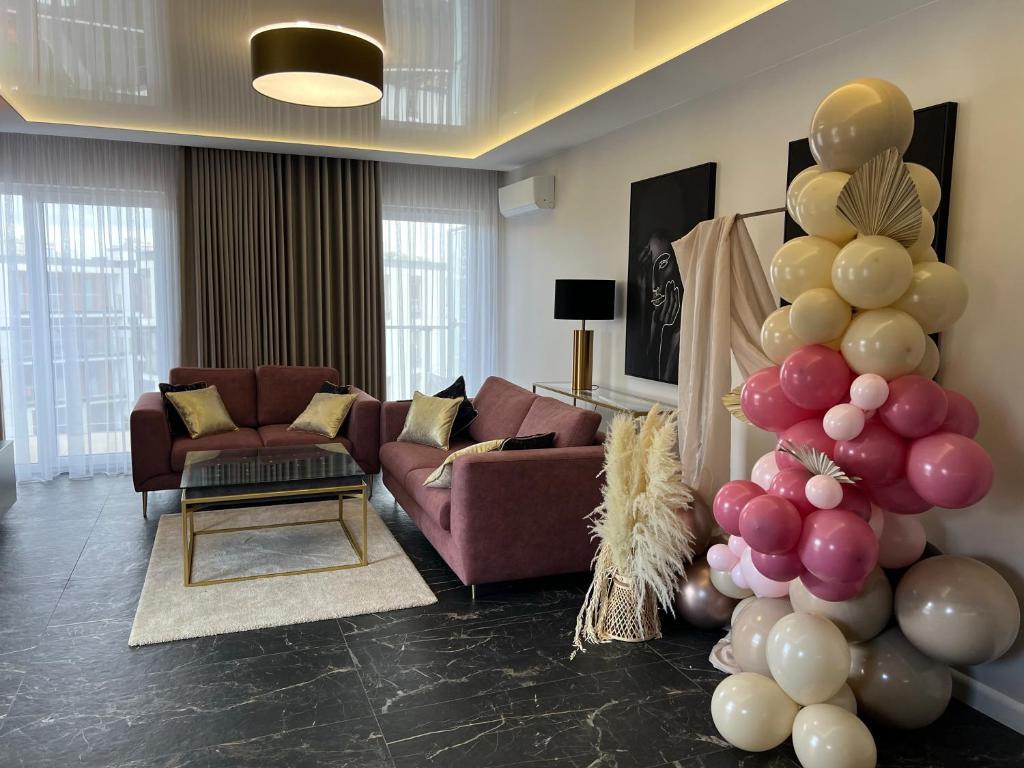 Posezení v ubytování Apartament Primavera 3 MINI SPA Komfort dla grup biznesowych , rodzin ,osób indywidualnych