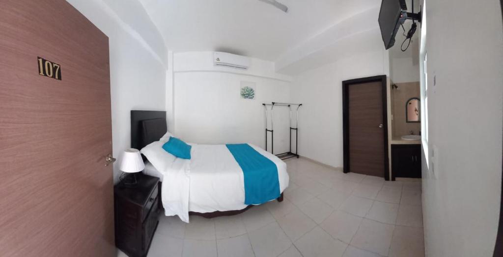 Postel nebo postele na pokoji v ubytování Hotel boutique turquesa