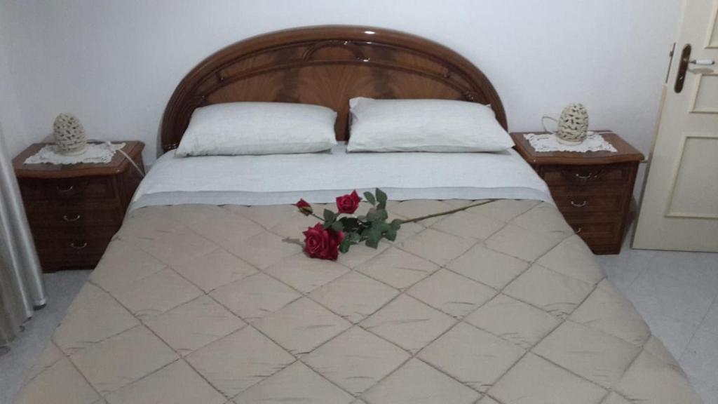Ein Bett oder Betten in einem Zimmer der Unterkunft "CVPERTINVM" casa per brevi periodi