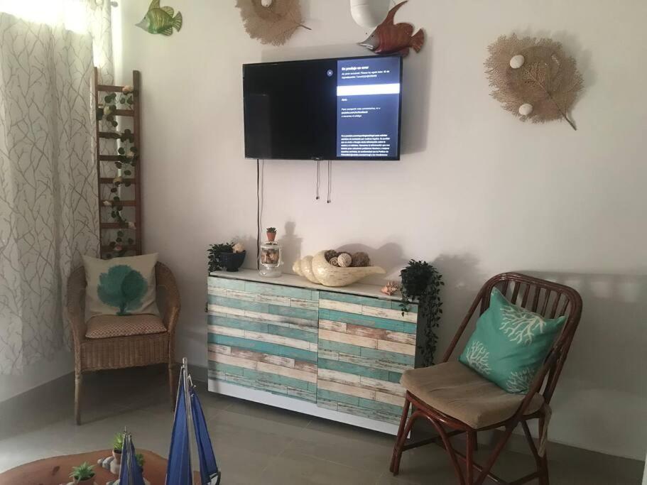 Una televisión o centro de entretenimiento en Juan Dolio apart1 hab
