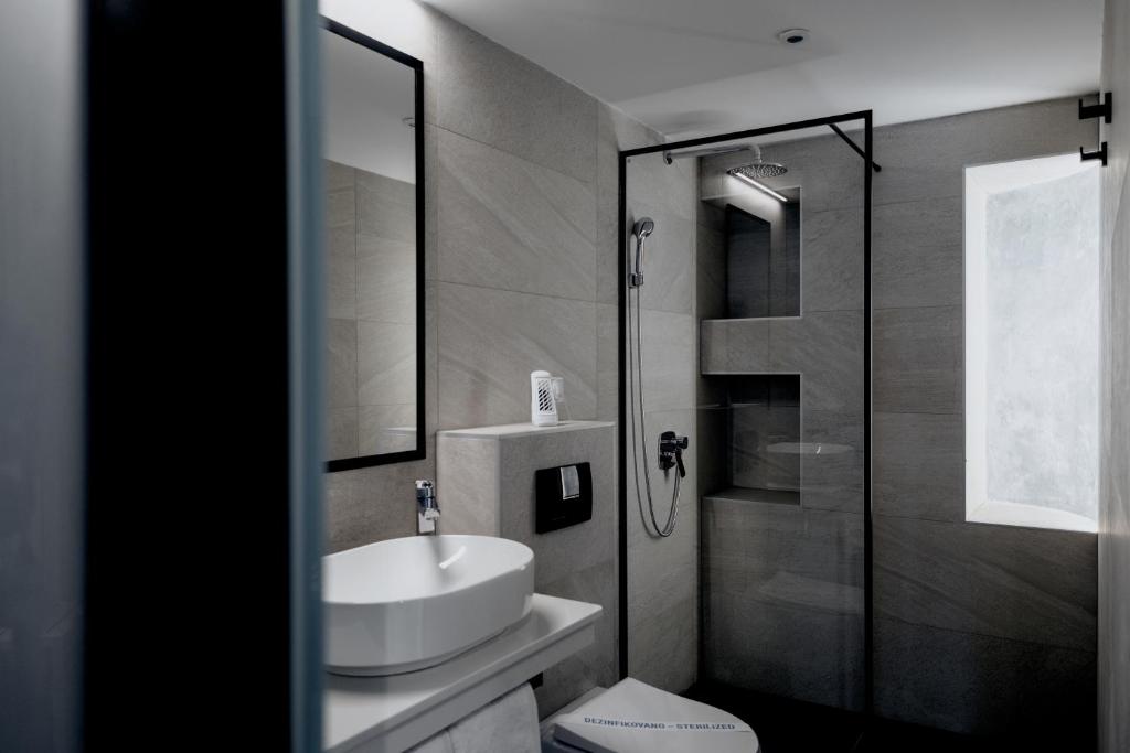 Boutique Macchiato Rooms - Resim 12