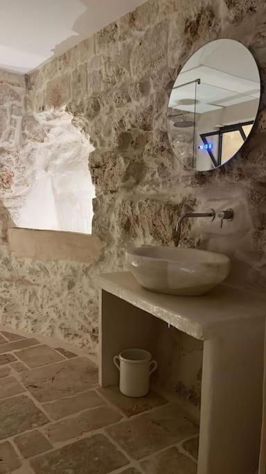 Koupelna v ubytování Suite Le Grotte
