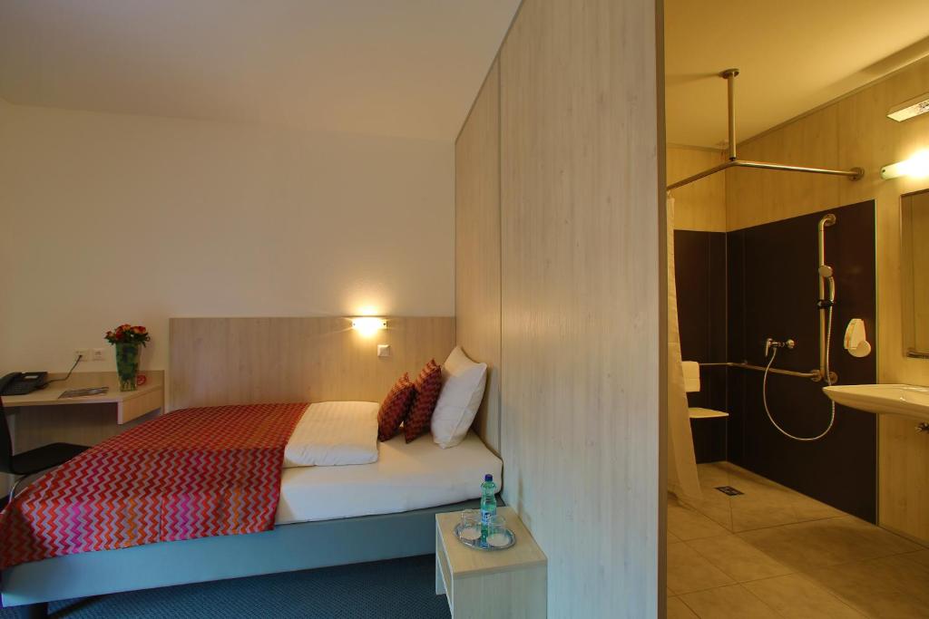 Postel nebo postele na pokoji v ubytování Best sleep Hotel