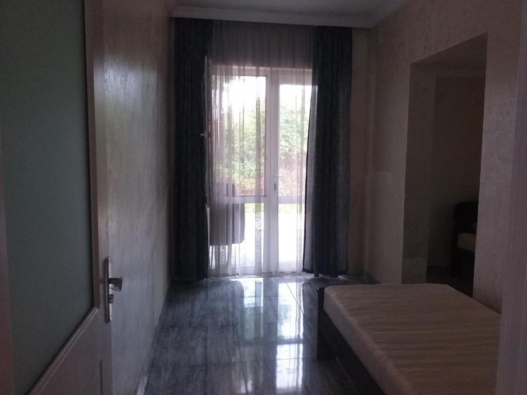 Postel nebo postele na pokoji v ubytování Family Hotel "Big House"
