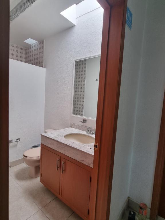 Koupelna v ubytování Residencia Ximatario
