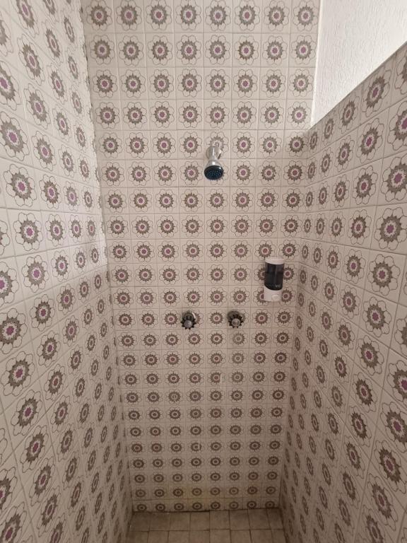 Koupelna v ubytování Residencia Ximatario