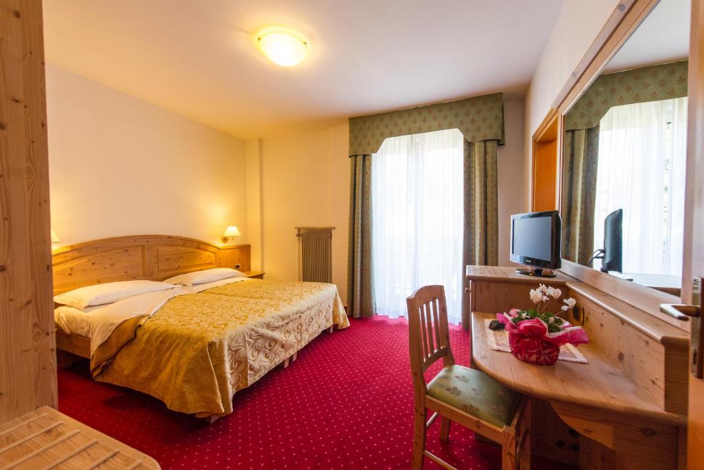 TV a/nebo společenská místnost v ubytování Hotel Lucia