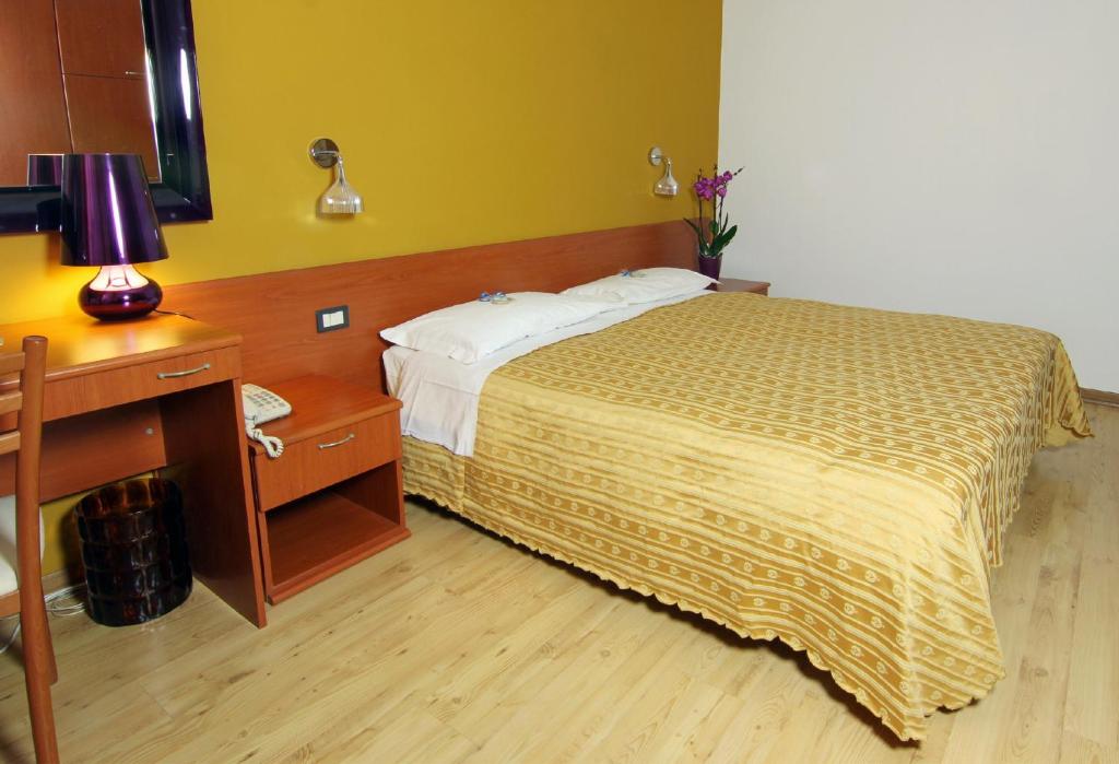 Postel nebo postele na pokoji v ubytování Albergo Al Viale