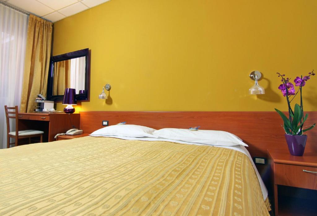 Postel nebo postele na pokoji v ubytování Albergo Al Viale