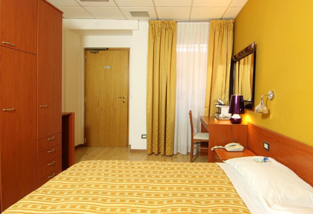 Postel nebo postele na pokoji v ubytování Albergo Al Viale
