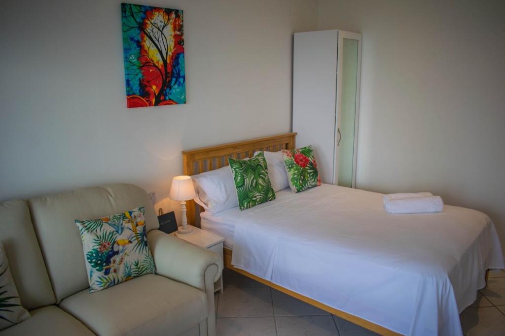 Postel nebo postele na pokoji v ubytování Morne SeaView Apartments