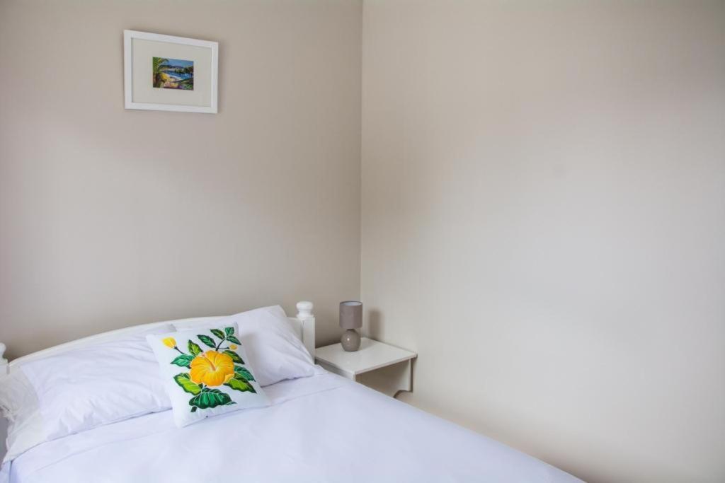 Postel nebo postele na pokoji v ubytování Morne SeaView Apartments