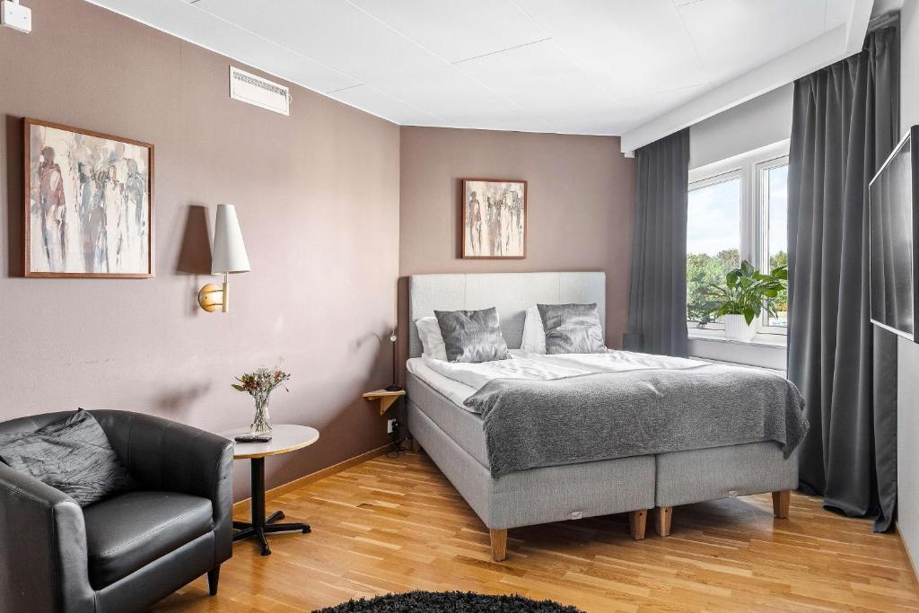 Postel nebo postele na pokoji v ubytování Best Western Hotel 23