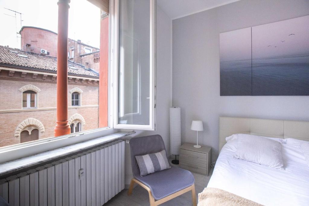 Posteľ alebo postele v izbe v ubytovaní Incantevole appartamento nel cuore di Bologna