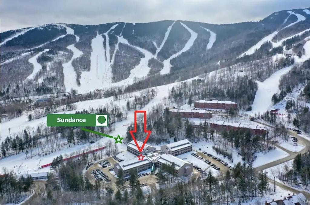 an aerial view of a ski resort in the snow at Sunday River Ski In Ski Out Mountain View Condo with Hot Tub Pool and Sauna! in Newry