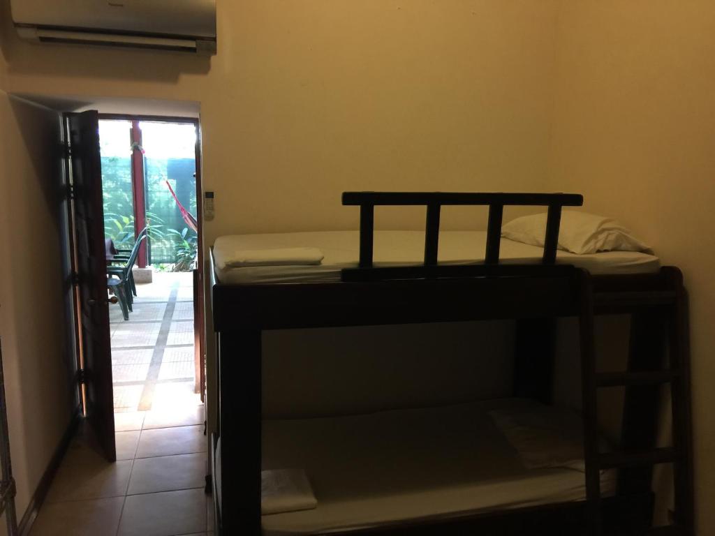 Postel nebo postele na pokoji v ubytování Cabinas surf Arribadas