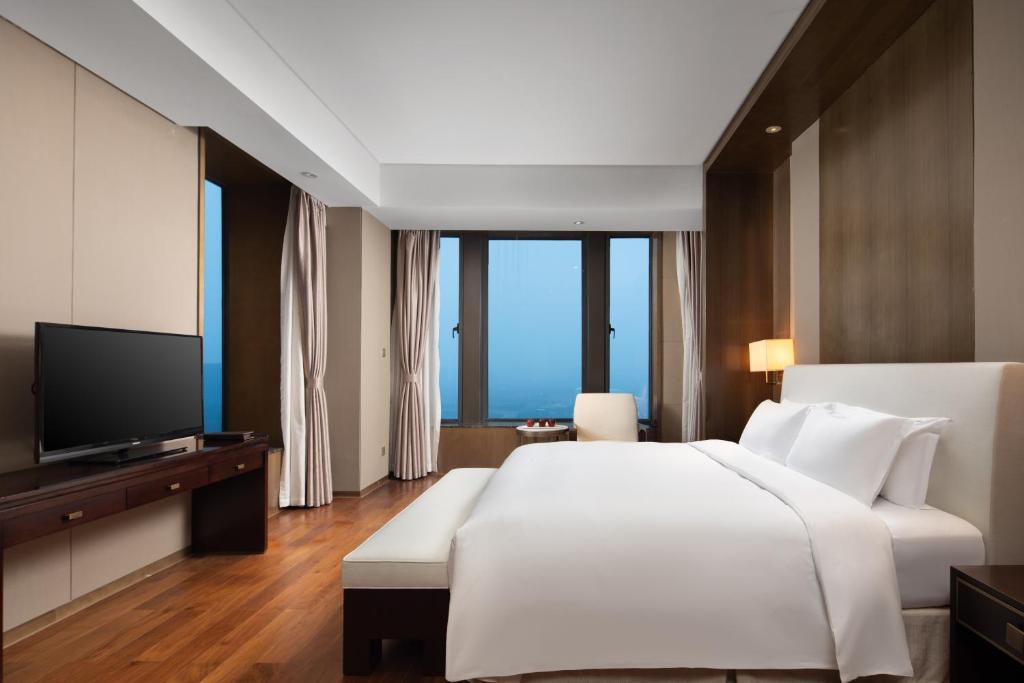 TV a/nebo společenská místnost v ubytování Yun Hotel Wuhan