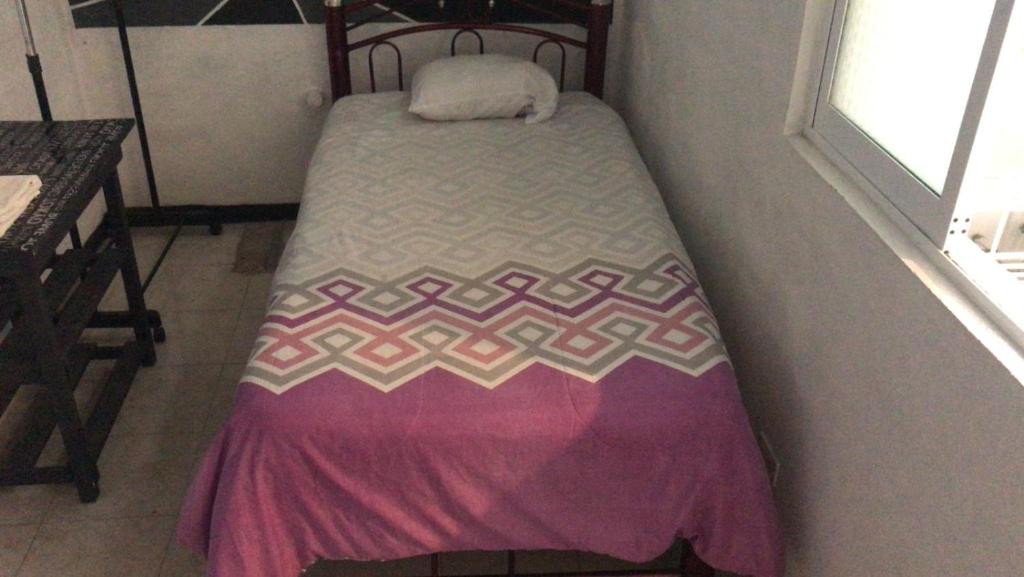 Letto o letti in una camera di Hotelito Ejido