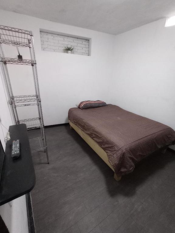 Letto o letti in una camera di Hotelito Ejido