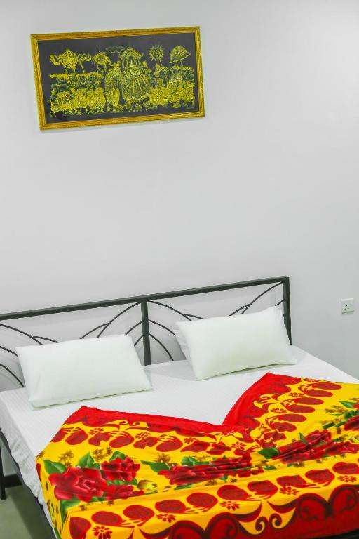 Postel nebo postele na pokoji v ubytování Sandy Palms Guesthouse