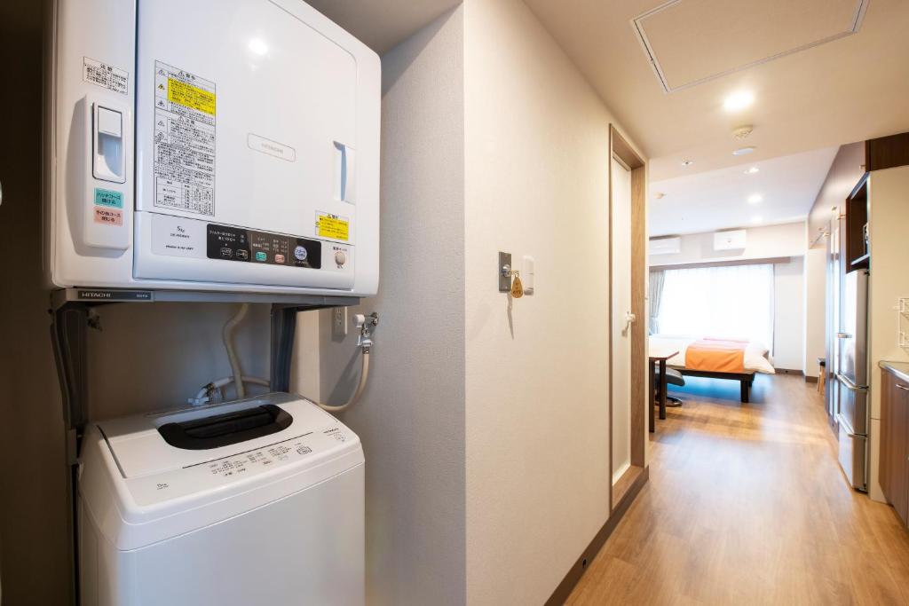 Kuchyň nebo kuchyňský kout v ubytování Hotel New Port Yokosuka