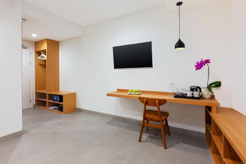 Kuchyň nebo kuchyňský kout v ubytování favehotel Kediri