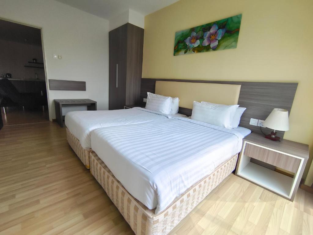 Postel nebo postele na pokoji v ubytování Hotel MetraSquare