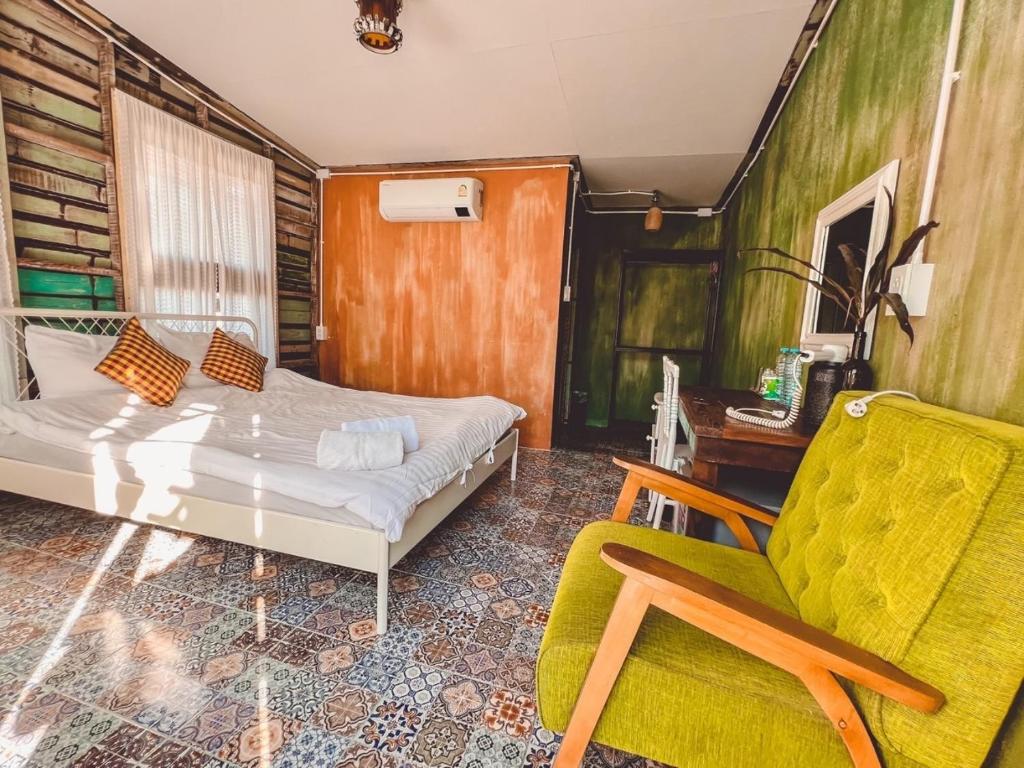 Postel nebo postele na pokoji v ubytování Klongmad Hostel Kohkood คลองมาดโฮสเทล