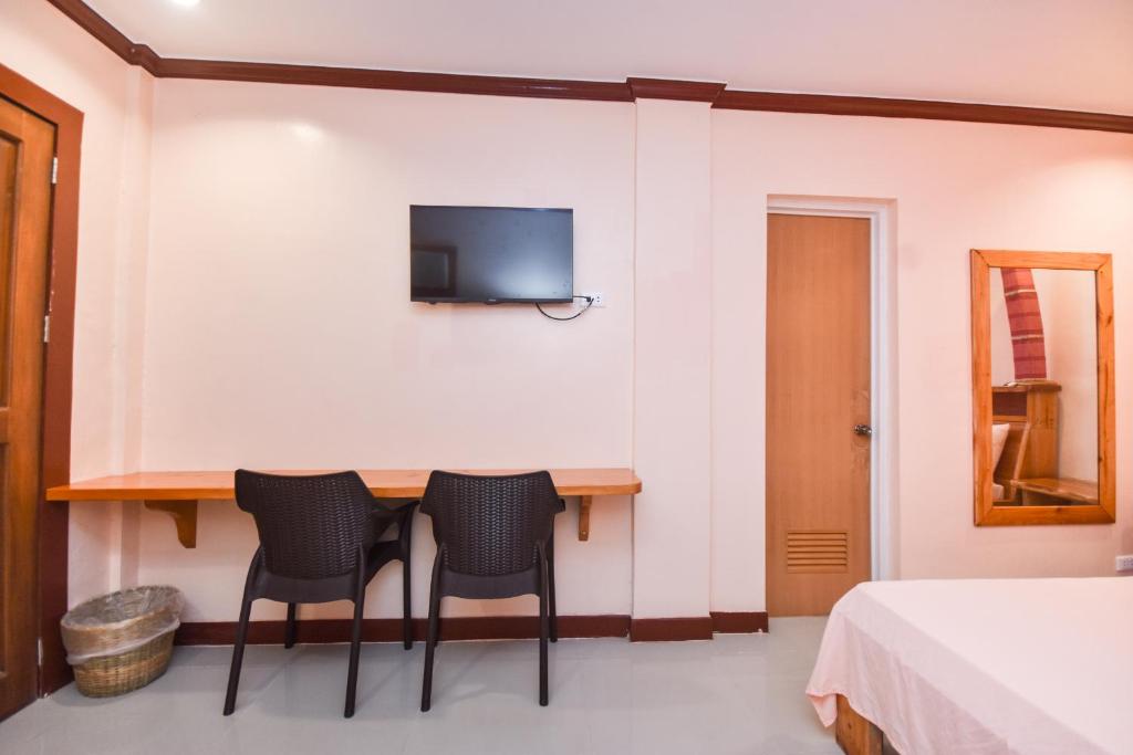 TV a/nebo společenská místnost v ubytování Nigi Nigi Too Beach Resort