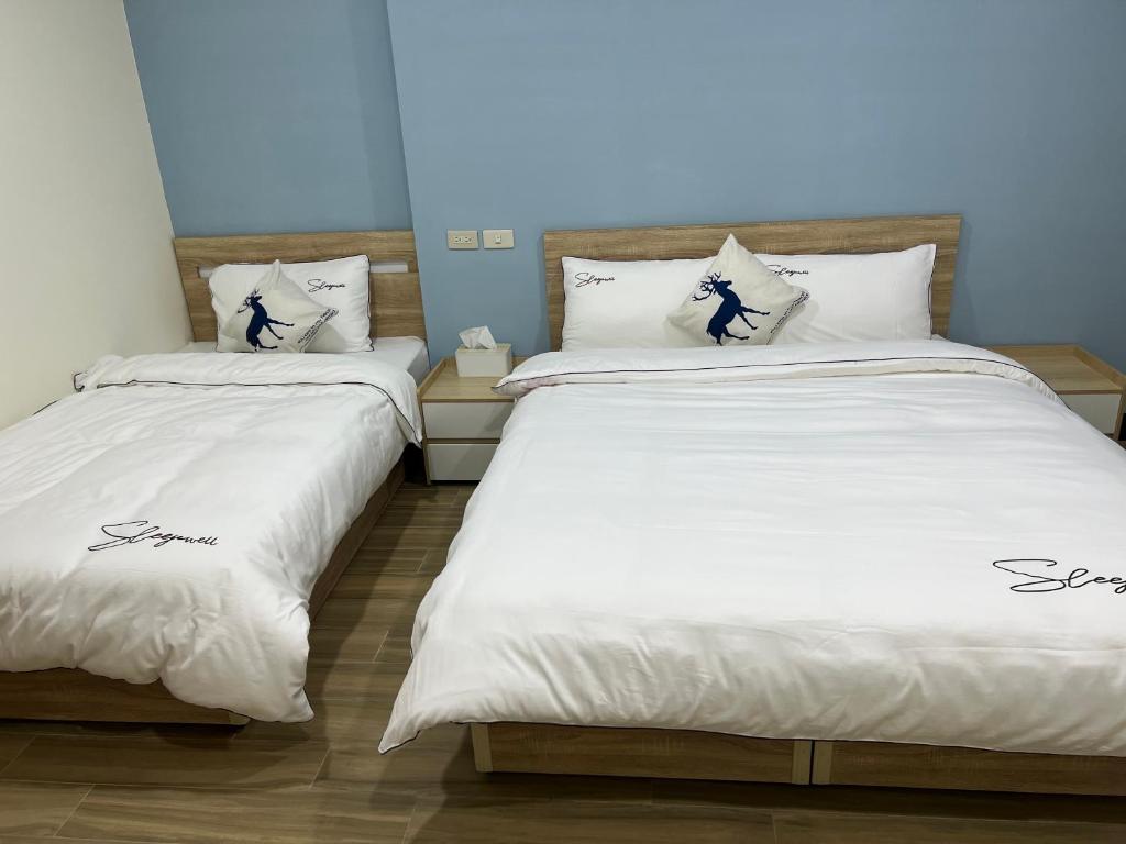 Postel nebo postele na pokoji v ubytování Downtown Accommodation