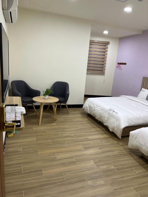 Postel nebo postele na pokoji v ubytování Downtown Accommodation