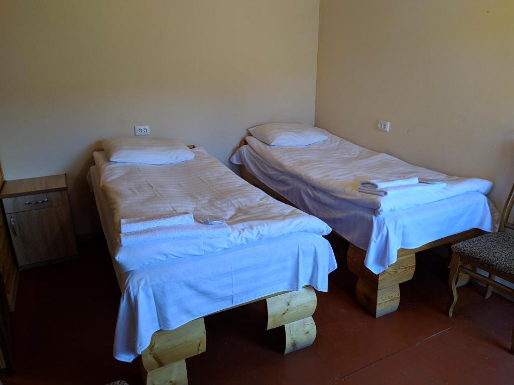 Postel nebo postele na pokoji v ubytování Old Halidzor