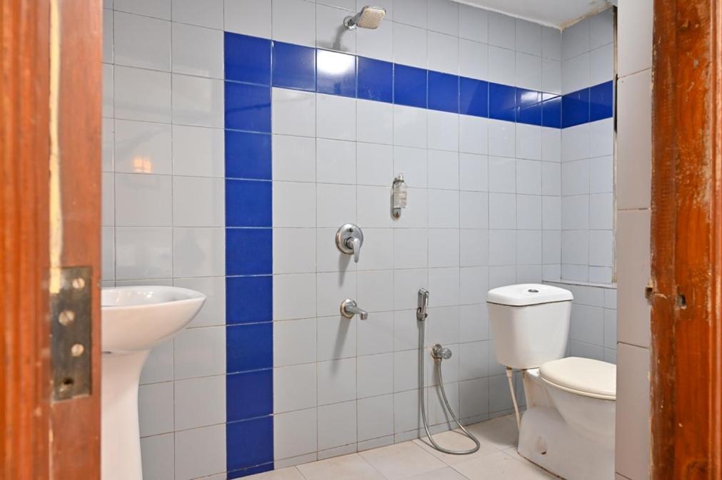 Koupelna v ubytování Regenta Inn Palacio De Goa, Panjim