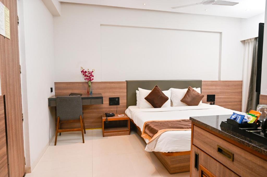Postel nebo postele na pokoji v ubytování Regenta Inn Palacio De Goa, Panjim