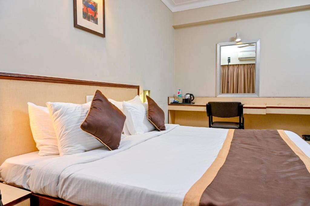 Postel nebo postele na pokoji v ubytování Regenta Inn Palacio De Goa, Panjim