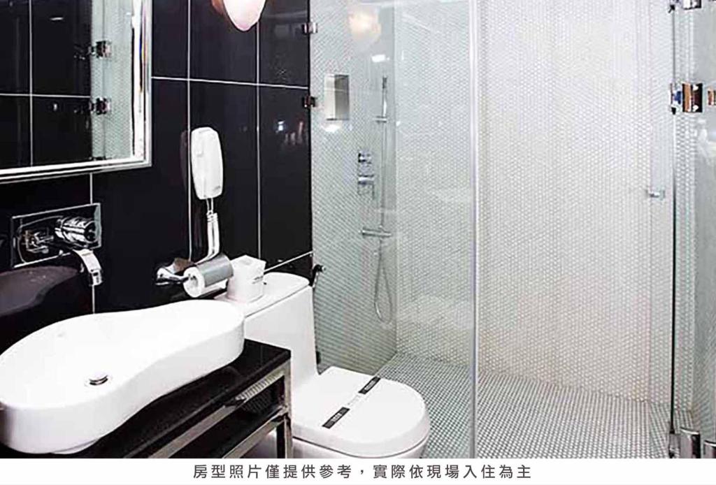 Koupelna v ubytování Royal Group Hotel Chun Shan Branch