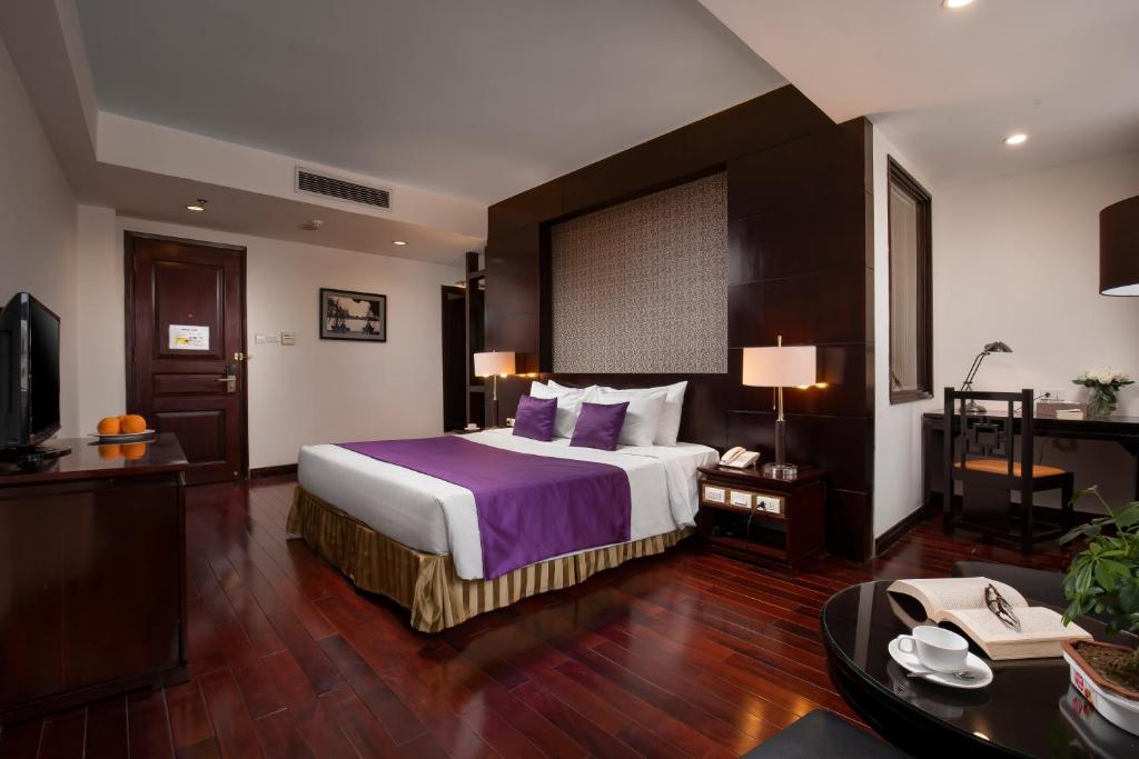 Postel nebo postele na pokoji v ubytování TK123 Hanoi Hotel