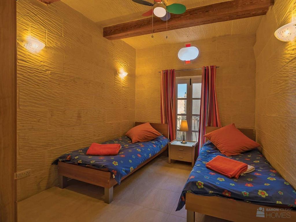 Postel nebo postele na pokoji v ubytování Hanini Holiday Home